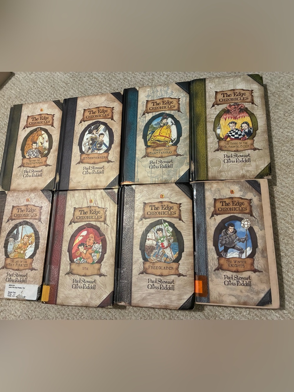 hardcover books from The Edge Chronicles series 1-8